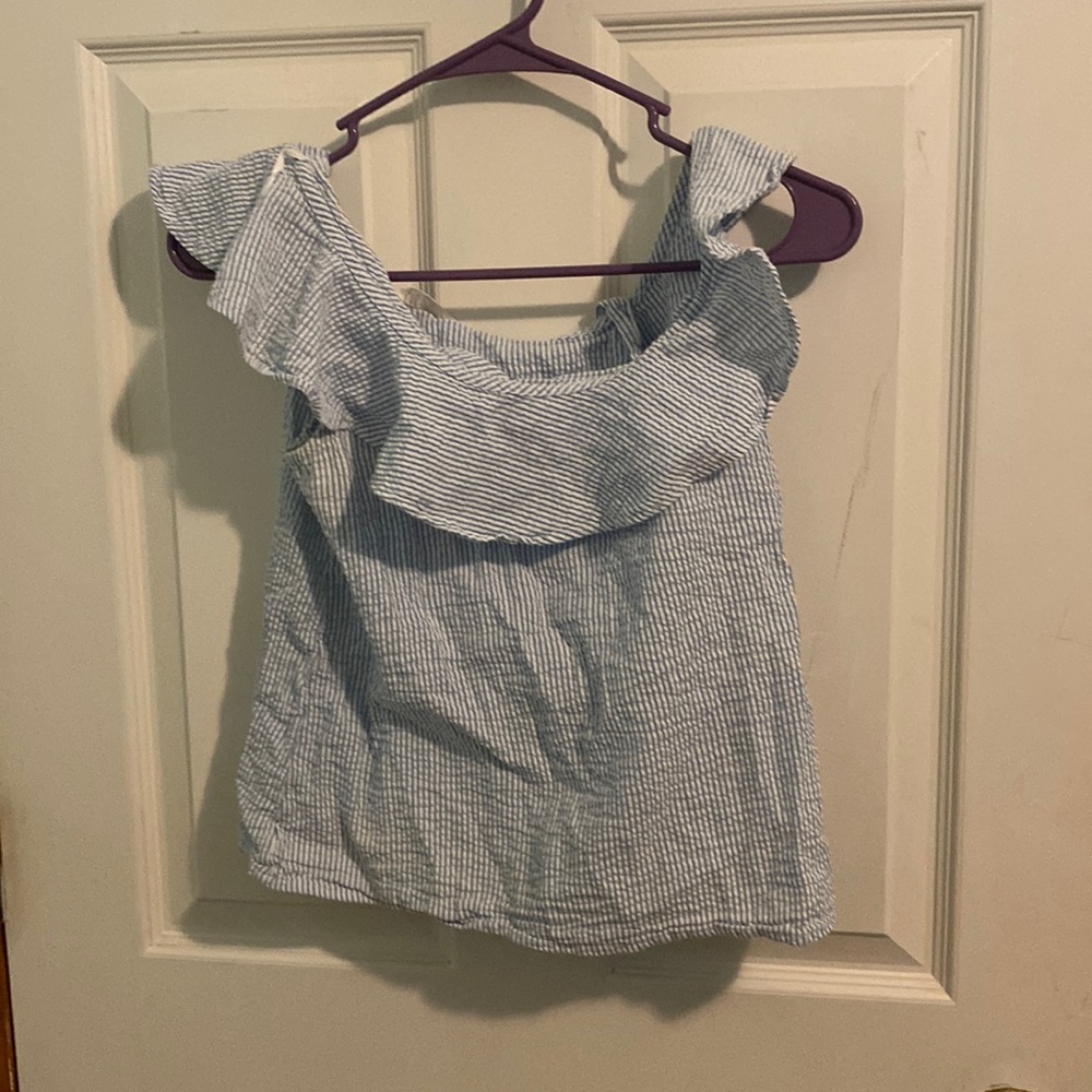 I am selling this baby blue blouse.
